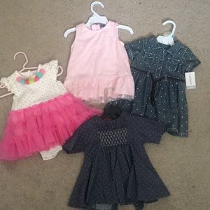 Baby girl dresses . Size 6 month